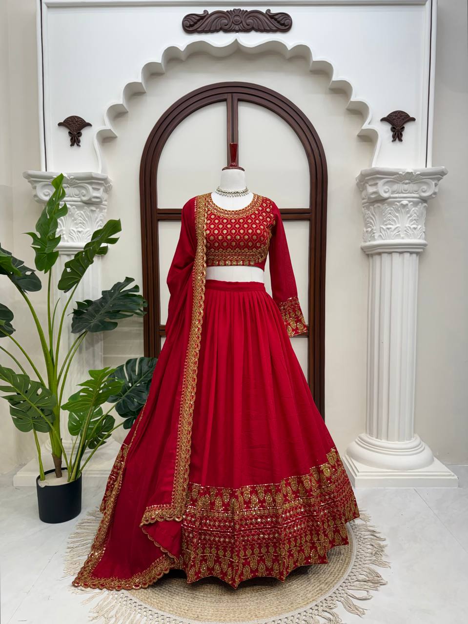 Classic Crimson Red Bridal Lehenga Choli Featuring Opulent Gold Zari Embroidery and Scalloped Borders